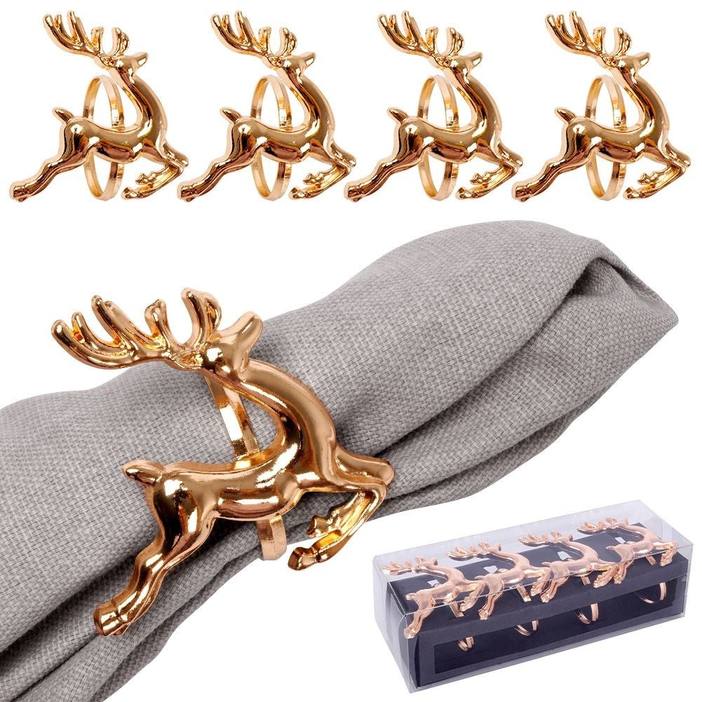 4 napkin rings in gold with reindeer, 4 cm diameter
