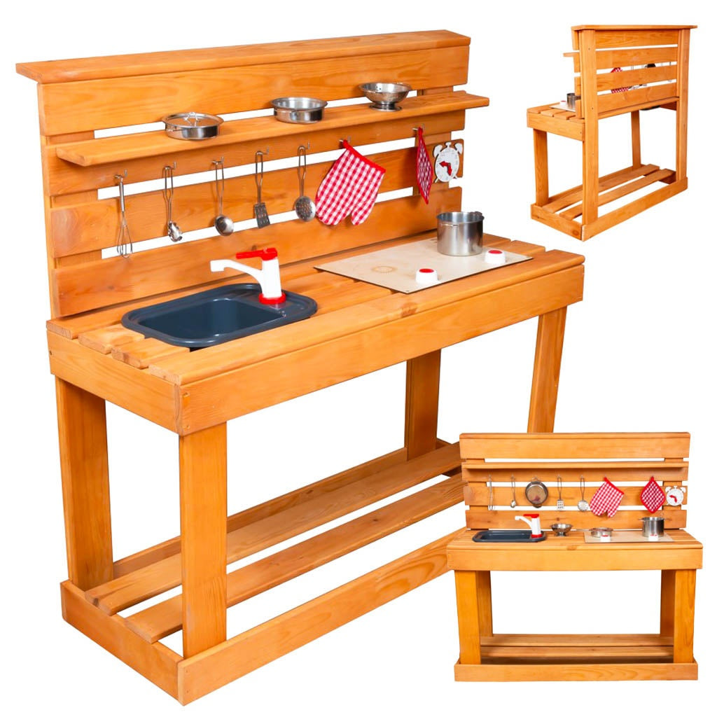 Backyard mud kitchen with wooden accessories