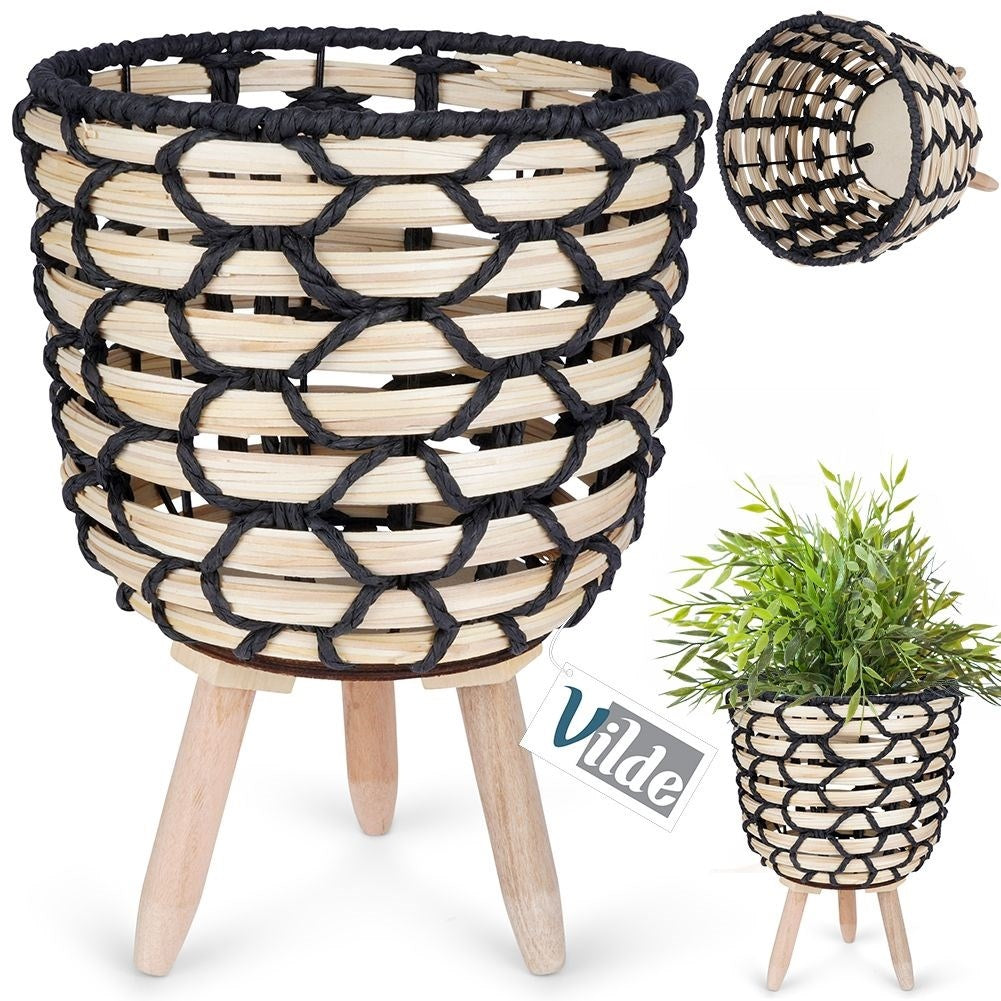 Beautiful flower pot in braided wooden design with sturdy wooden legs