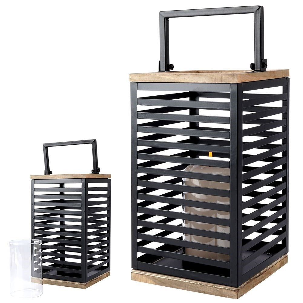 Black metal lantern with large glass insert for outside and inside