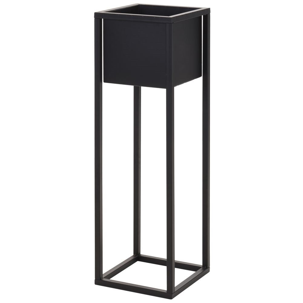 Black metal pot on stand in industrial style