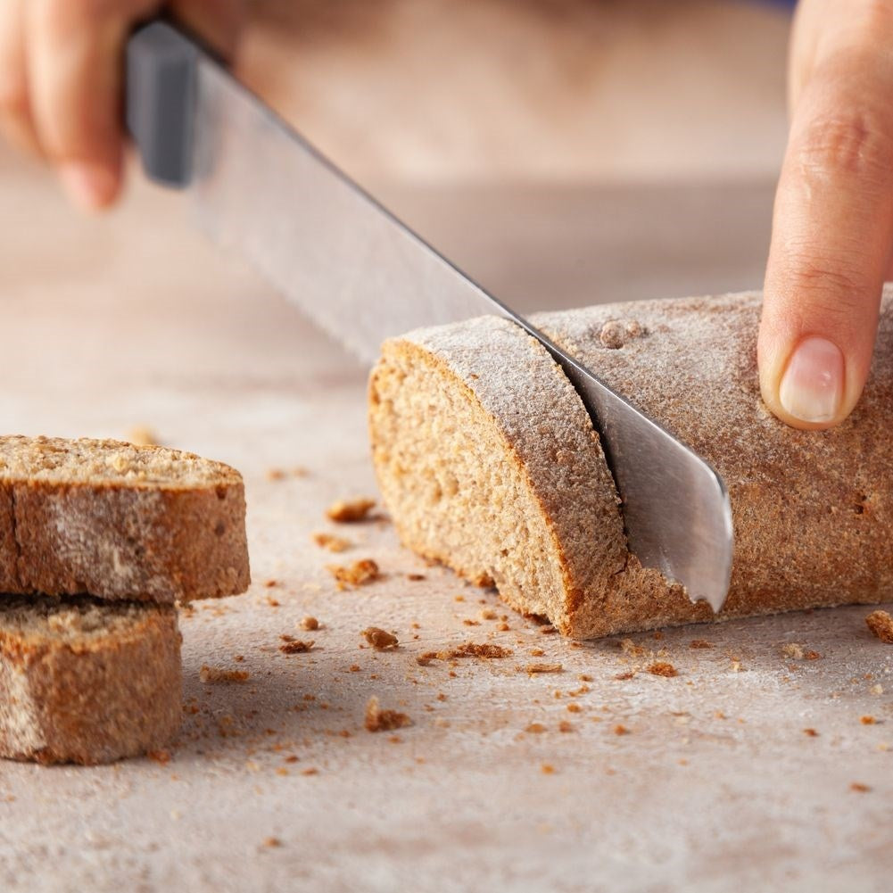 Bread knife with ergonomic handle and steel blade