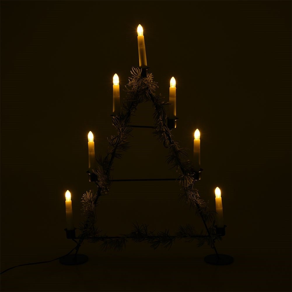 Christmas tree-shaped candle holder with seven candles