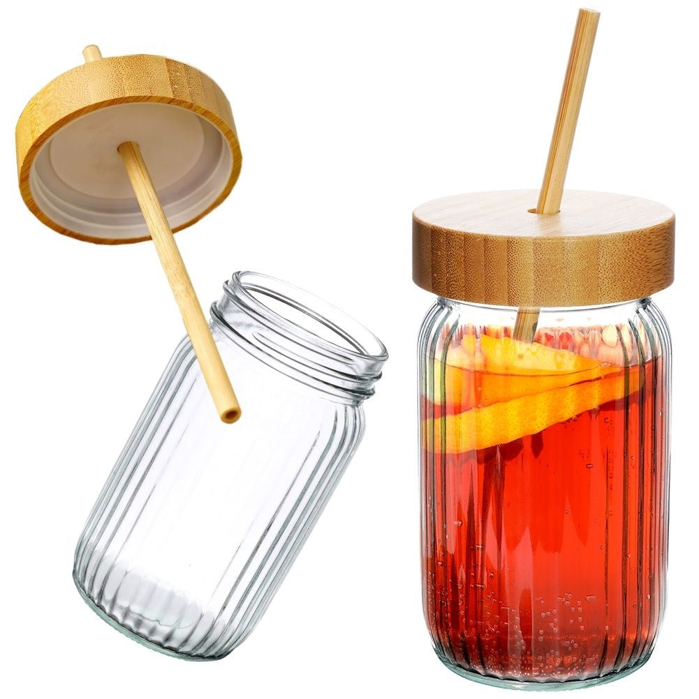 Drinking jar in thick glass with elegant stripes and bamboo straw