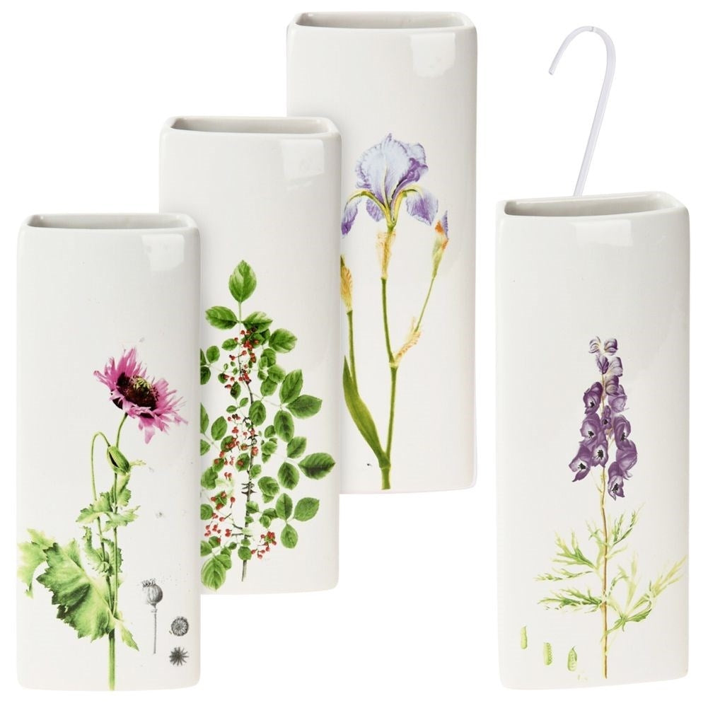 Four ceramic humidifiers with floral decorations for elements