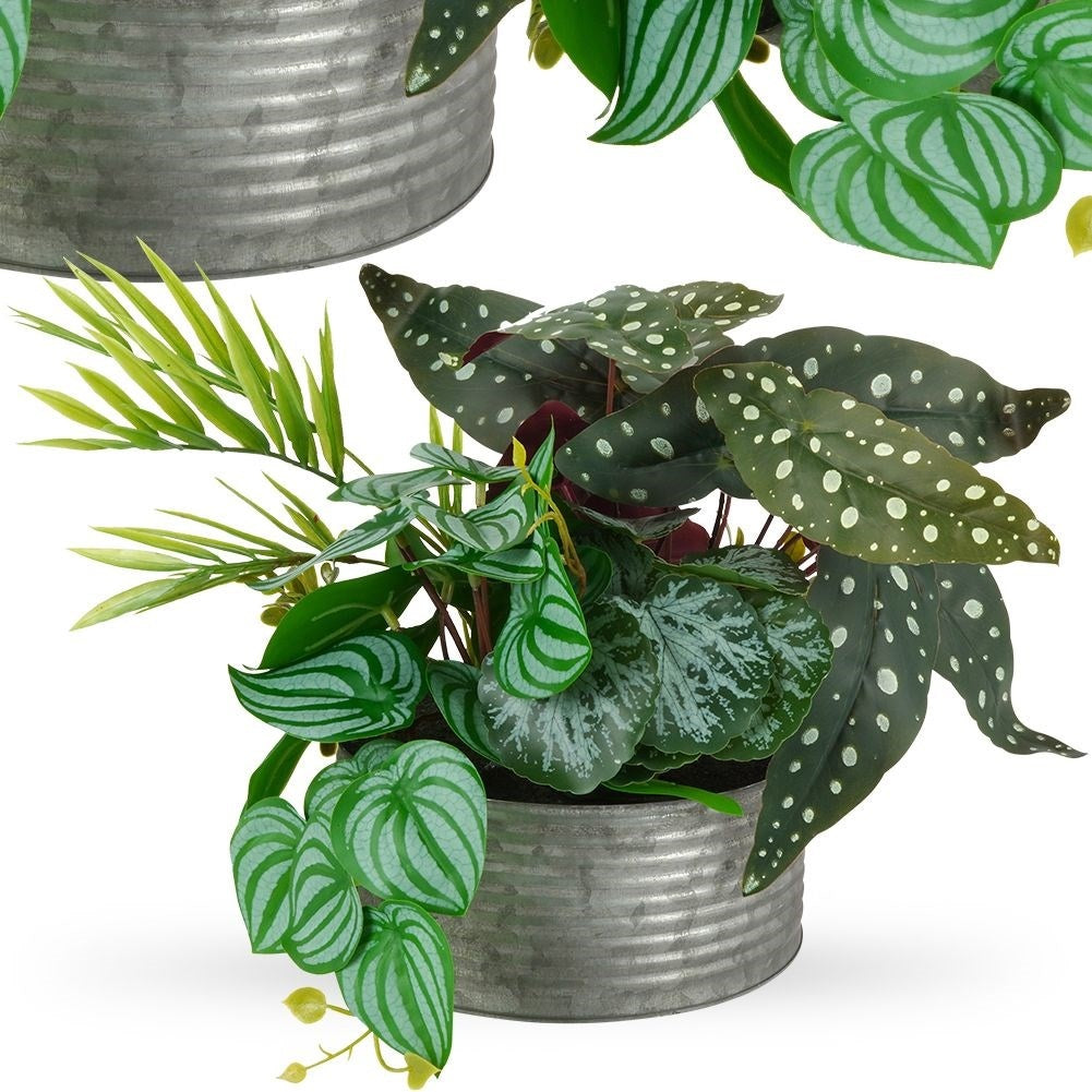 Four realistic artificial plants in pots without care