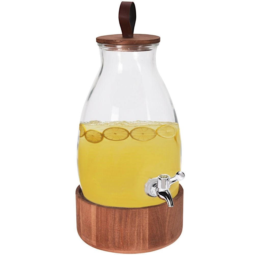 Glass jar with tap and wooden stand for drinks