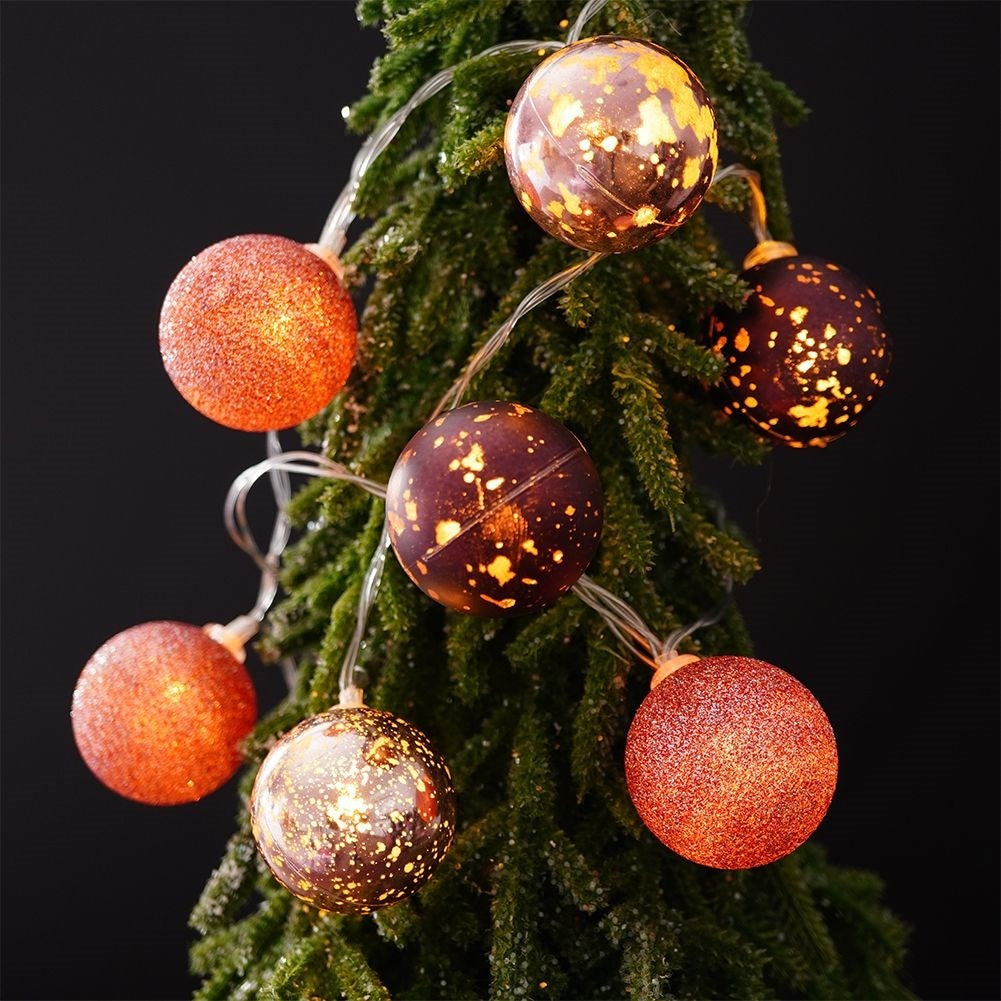 Glowing purple Christmas balls: matte, glittery, shiny, LED, indoor