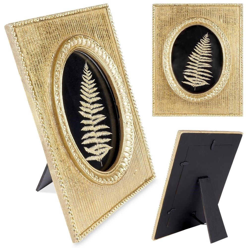 Gold-colored photo frame 10x15 cm in synthetic stone