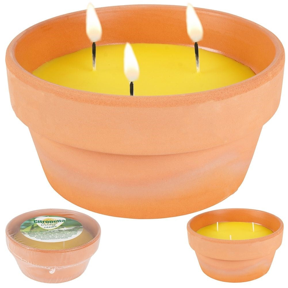 Lemon candle with three wicks in terracotta pot