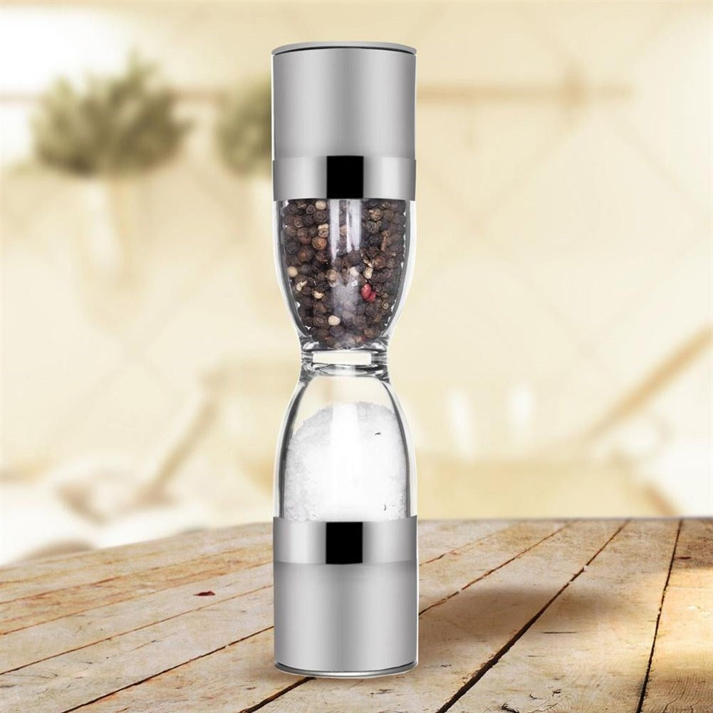 Manual grinder with ceramic grinding wheels for spices
