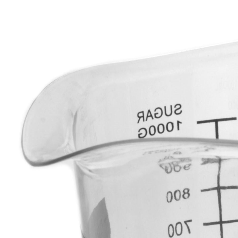 Measuring cup with comfortable handle and spout for precise measurement