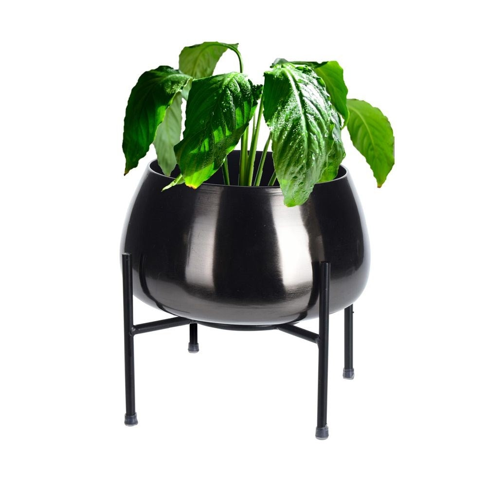 Original metal pot on stand. Stylish and elegant.