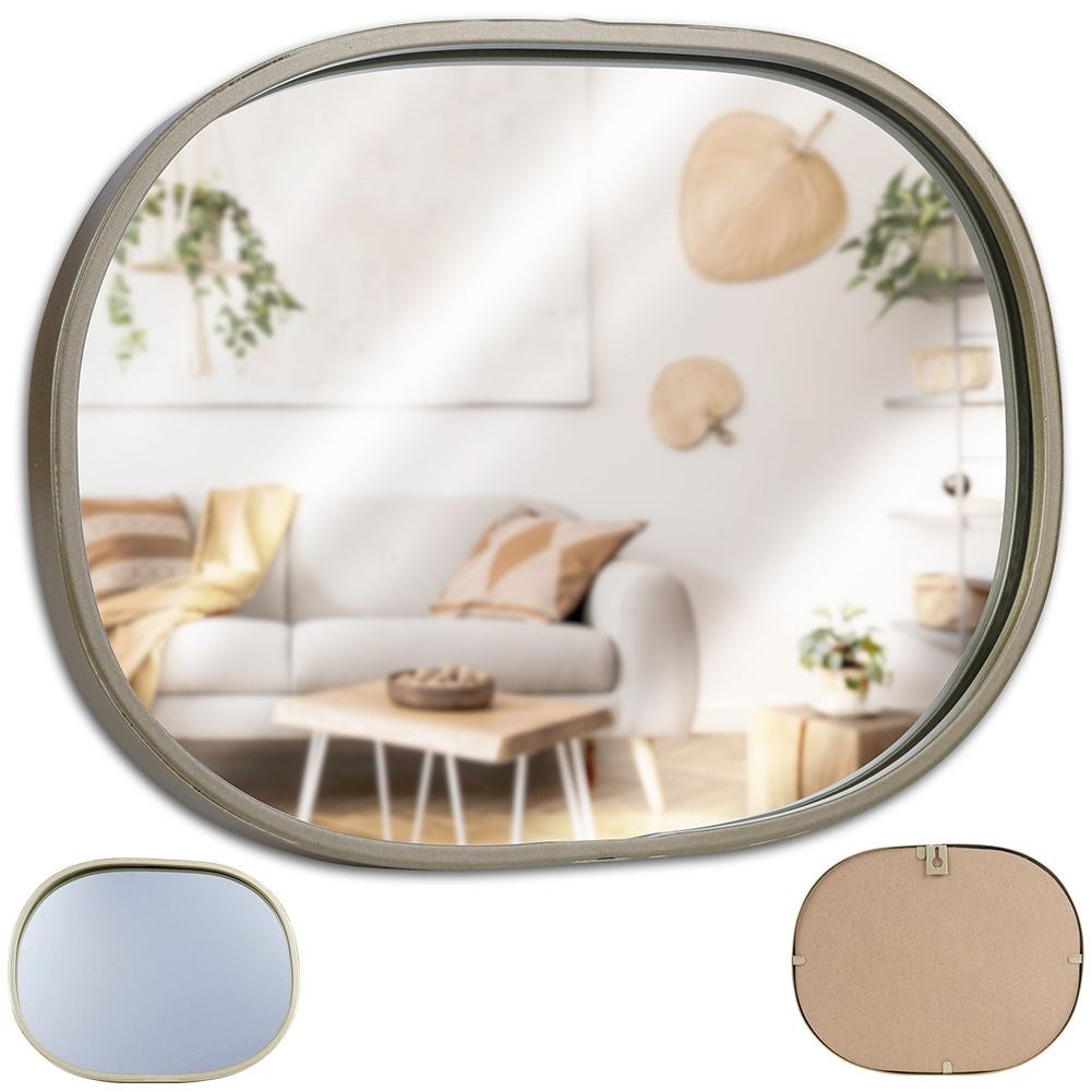 Oval wall mirror with champagne gold frame - elegant detail