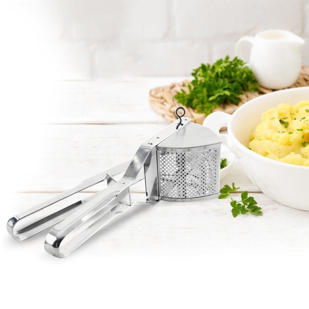 Potato press in stainless steel for perfect mashed potatoes.