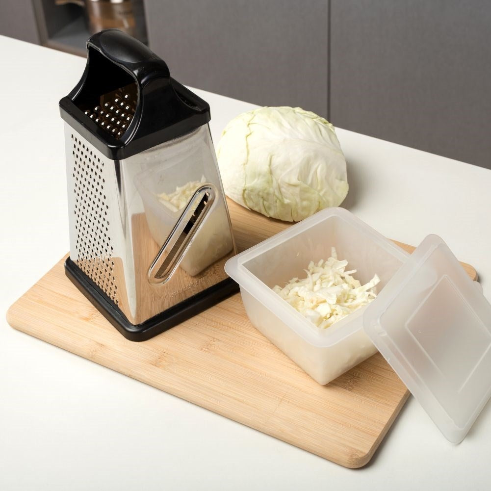 Practical grater with four blades and container for different food items