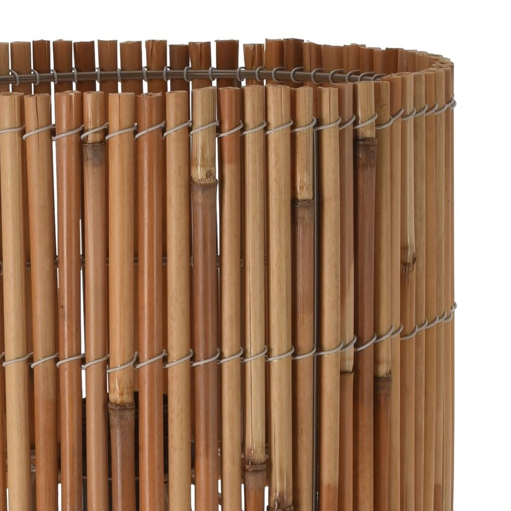 Rattan table lamp with black metal legs for any room
