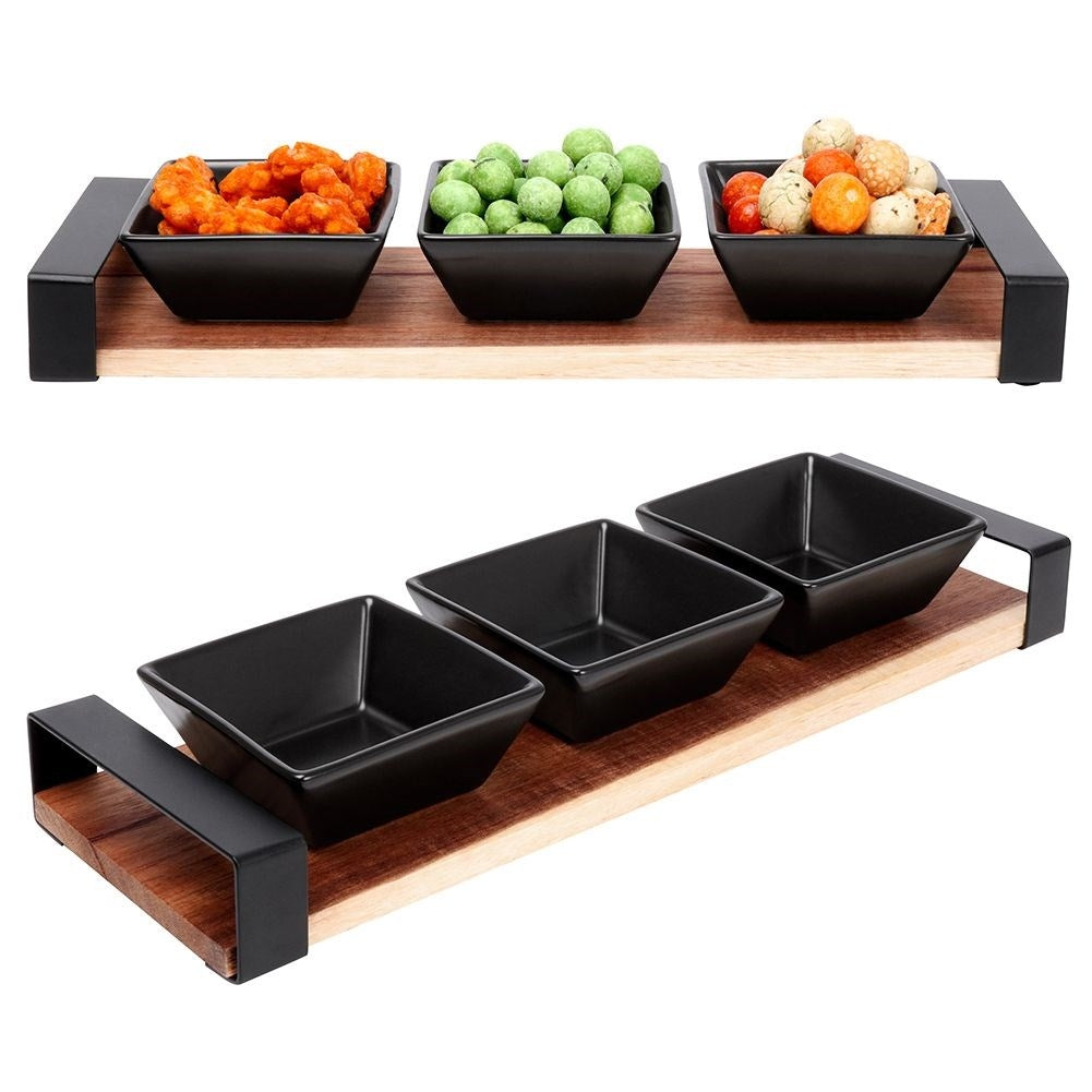 Set of three bowls on acacia tray for snacks and sauces