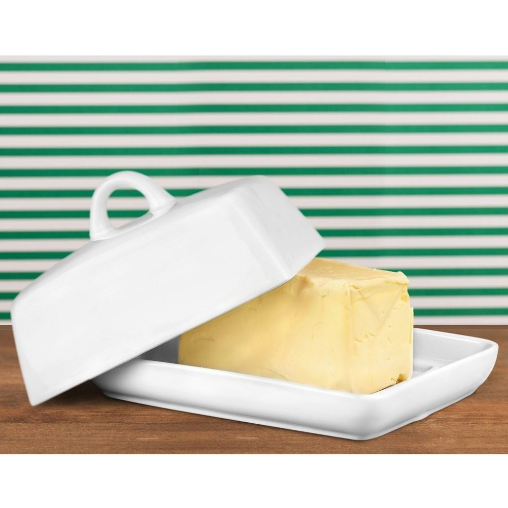 White ceramic butter bowl with lid and handle for serving