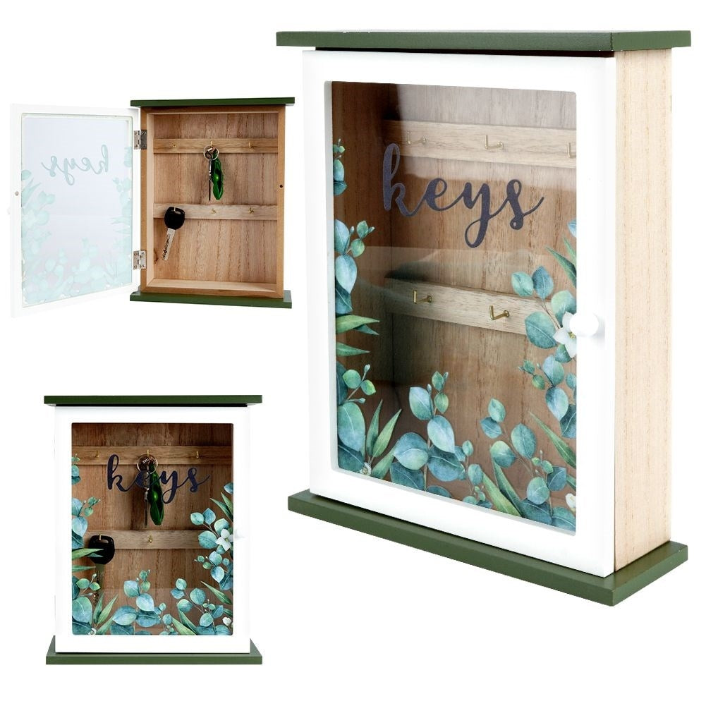Wooden cabinet with glass doors and leaf motif for keys