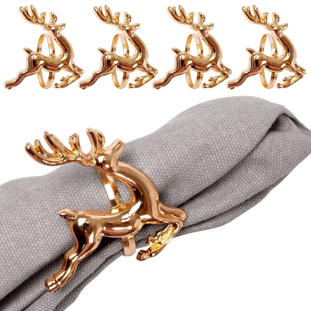 4 napkin rings in gold with reindeer, 4 cm diameter