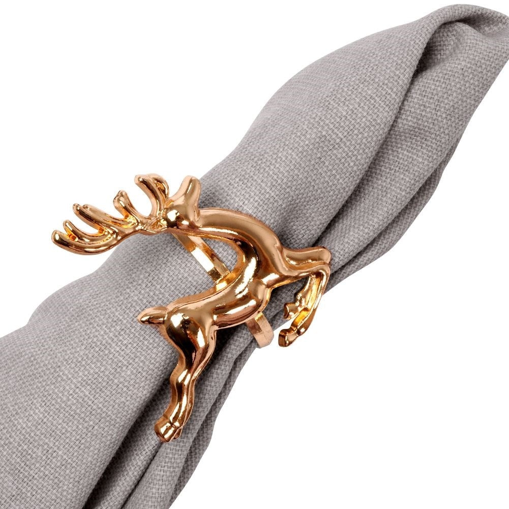 4 napkin rings in gold with reindeer, 4 cm diameter