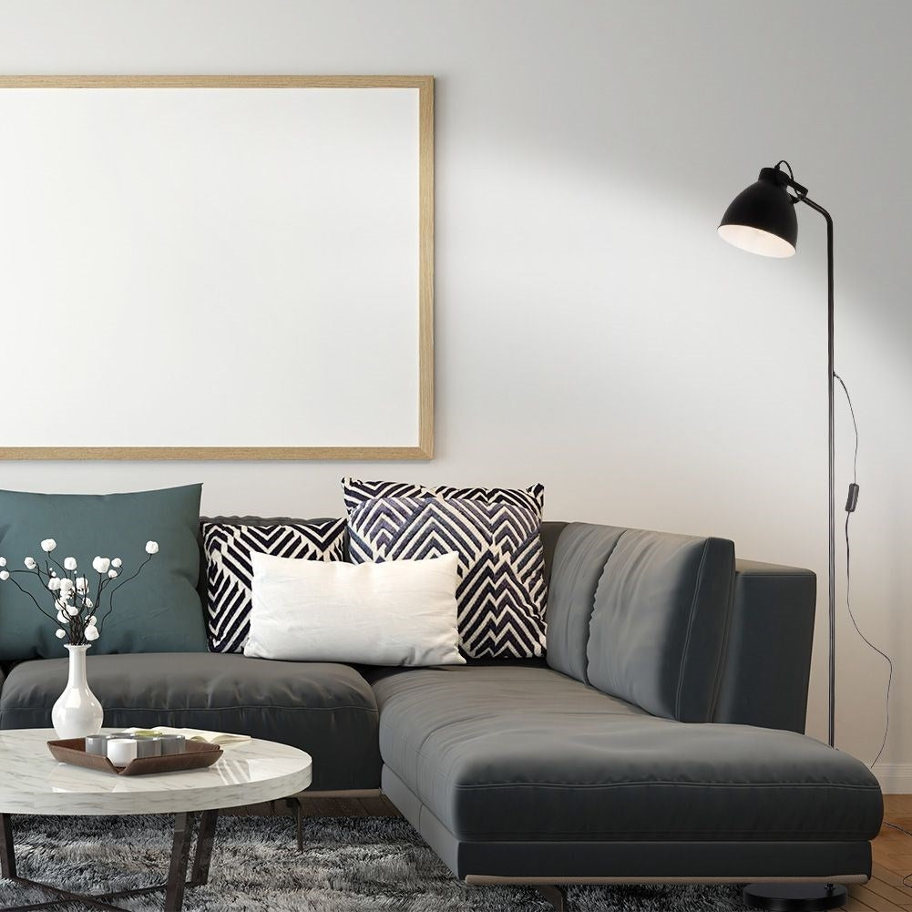 Adjustable black metal floor lamp with white interior