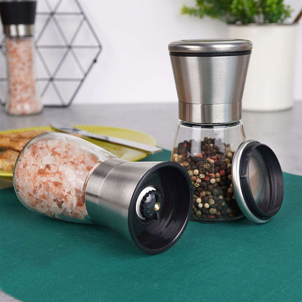Adjustable hand grinders for pepper and salt, set of two
