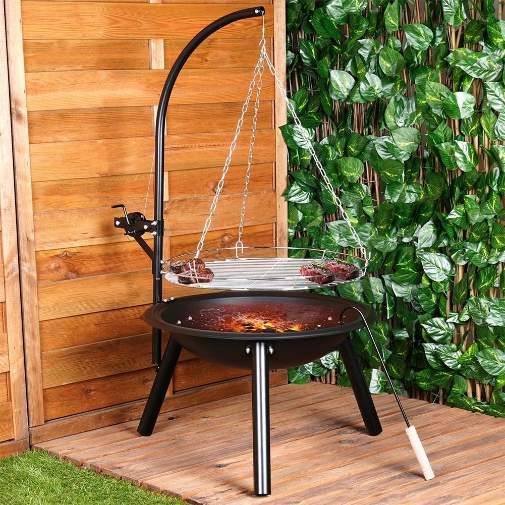 Adjustable metal fireplace with hanging grill grate for the garden
