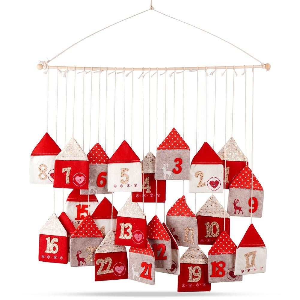 Advent calendar with 24 houses on a wooden stick