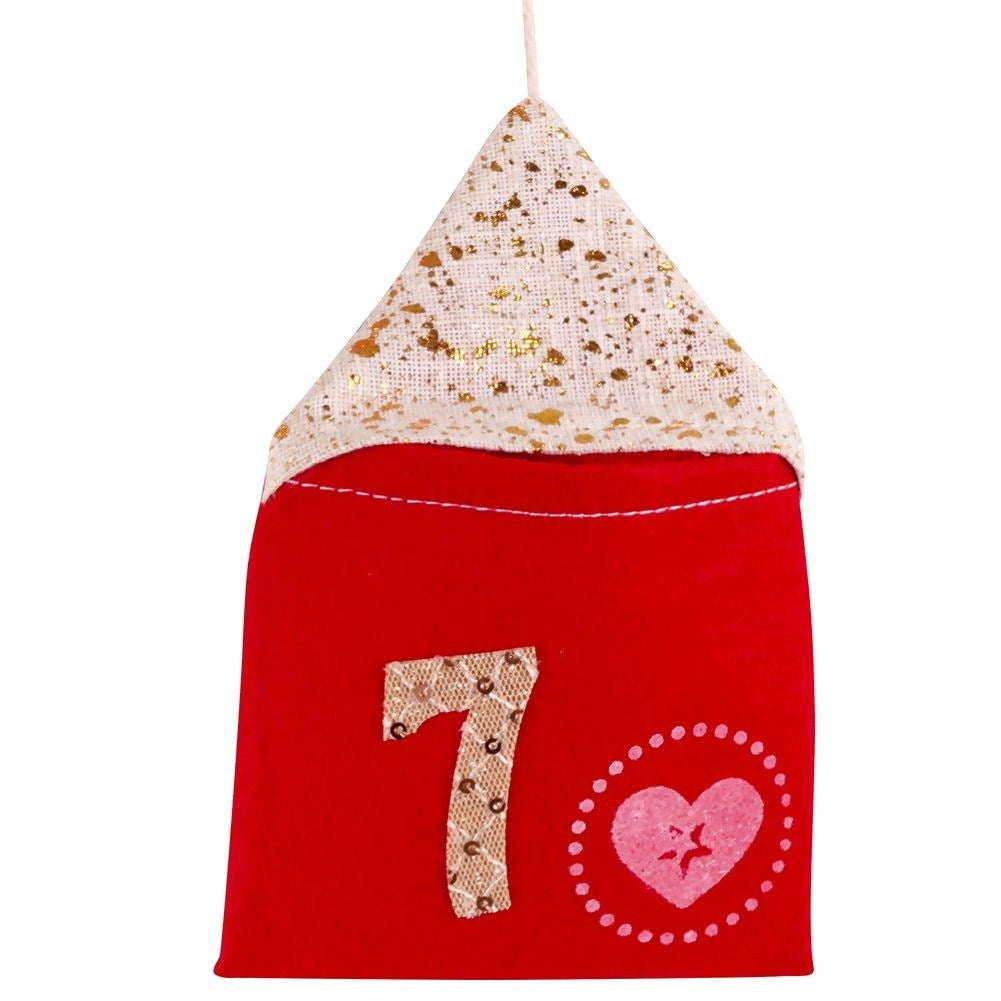Advent calendar with 24 houses on a wooden stick