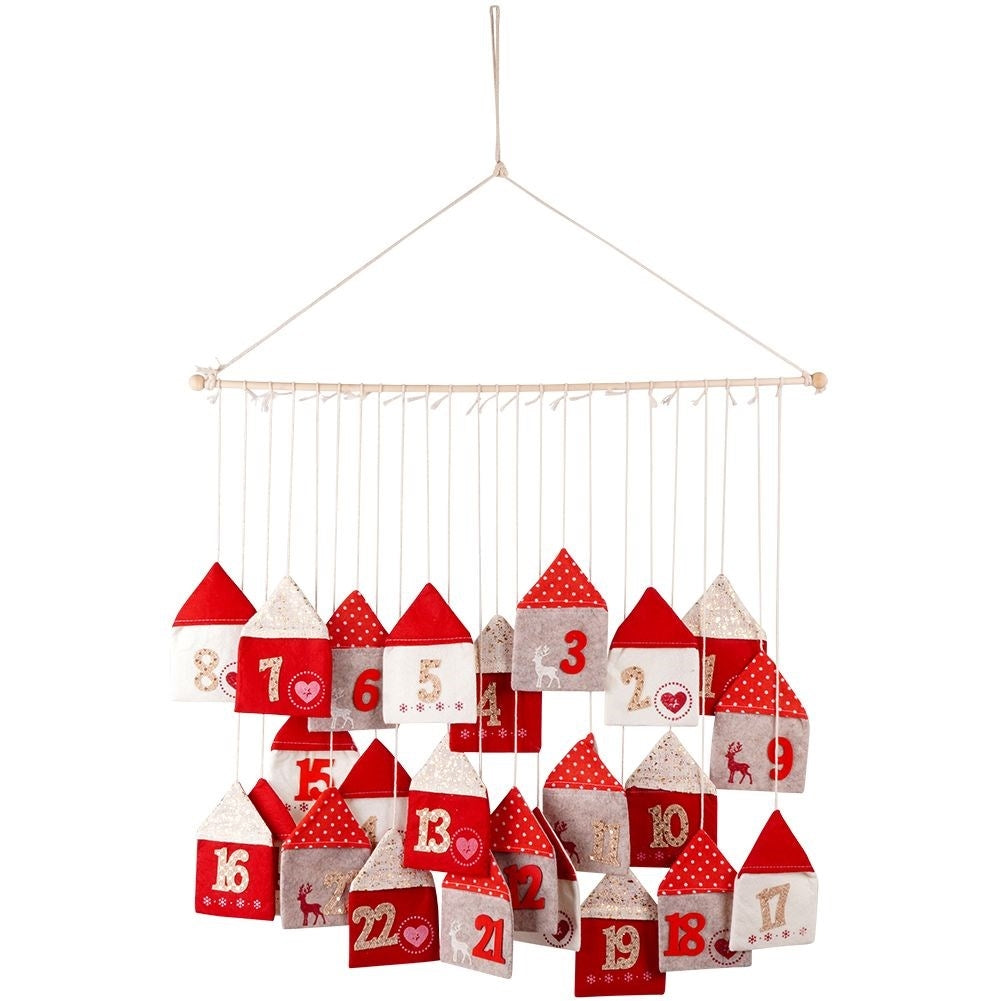 Advent calendar with 24 houses on a wooden stick