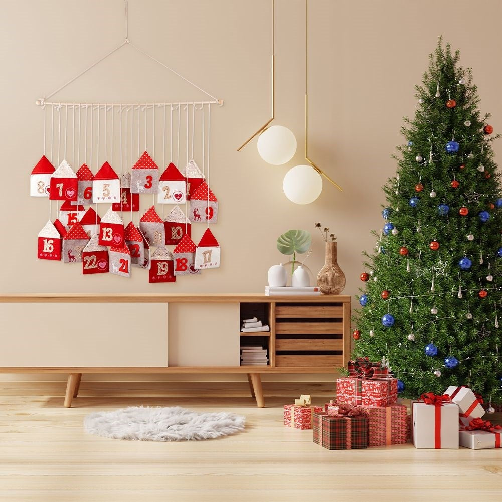 Advent calendar with 24 houses on a wooden stick