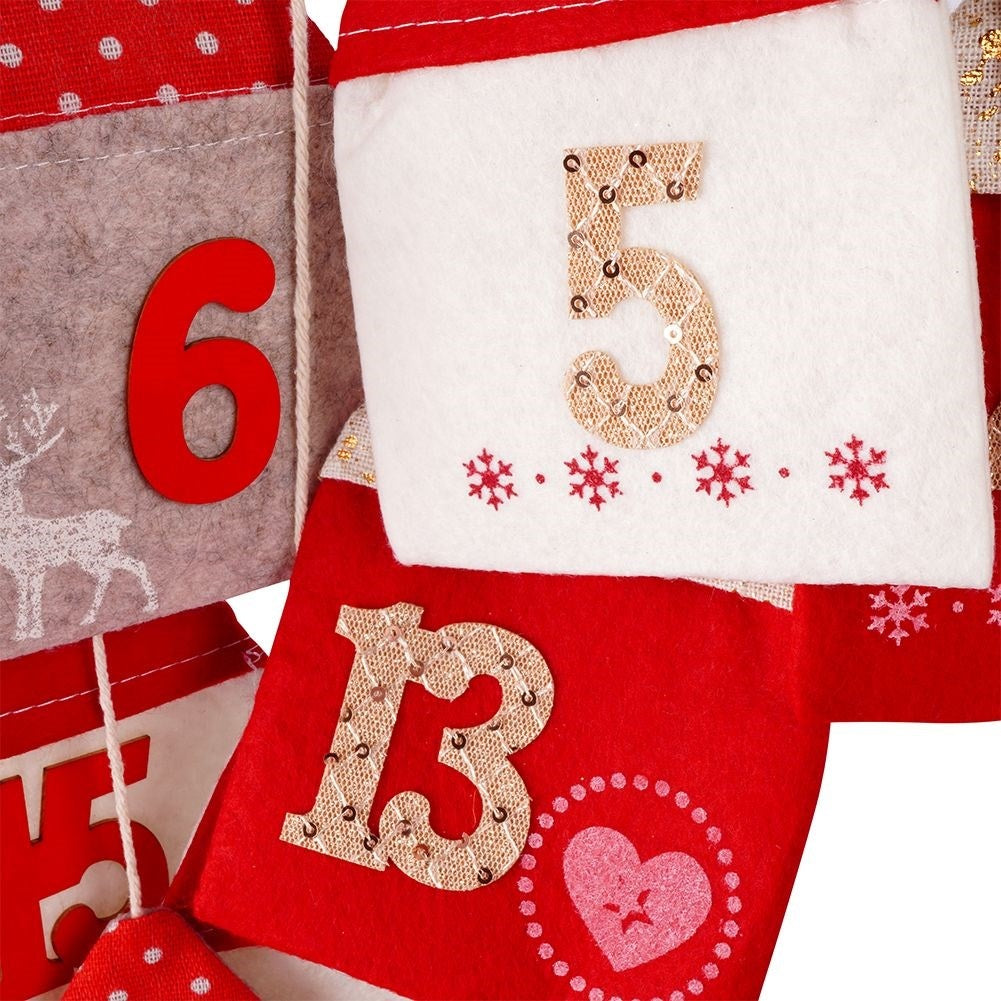 Advent calendar with 24 houses on a wooden stick