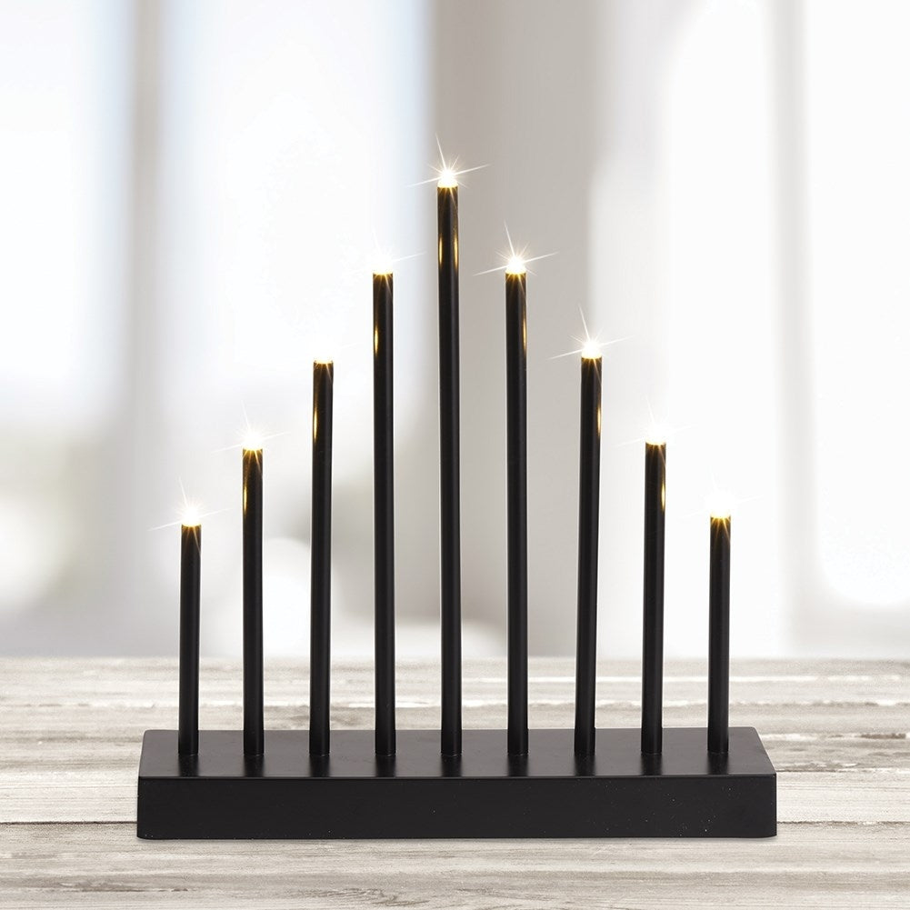 Advent candle holder with 9 LED lamps in black plastic