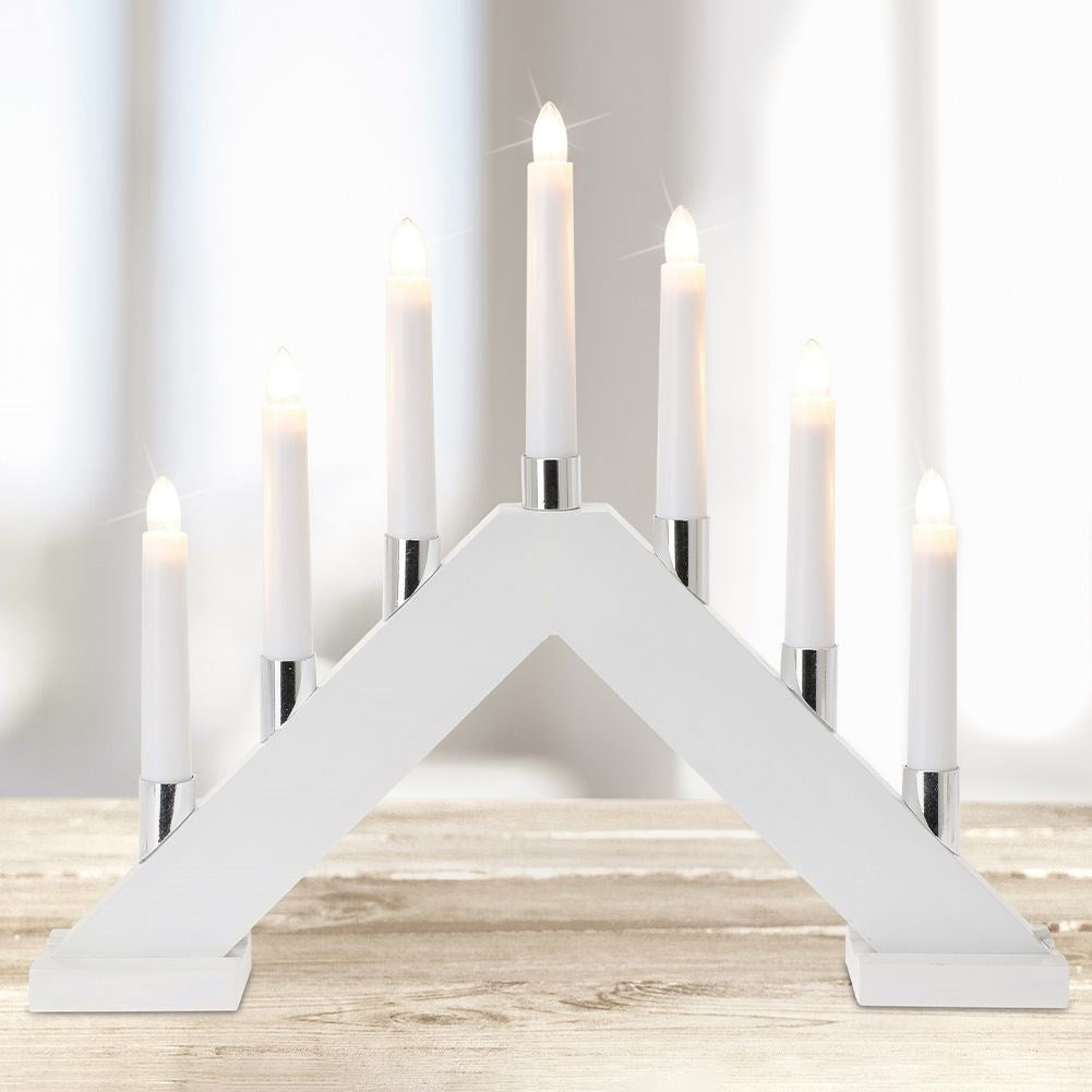 Advent candle holder with seven LED lights and white wooden base