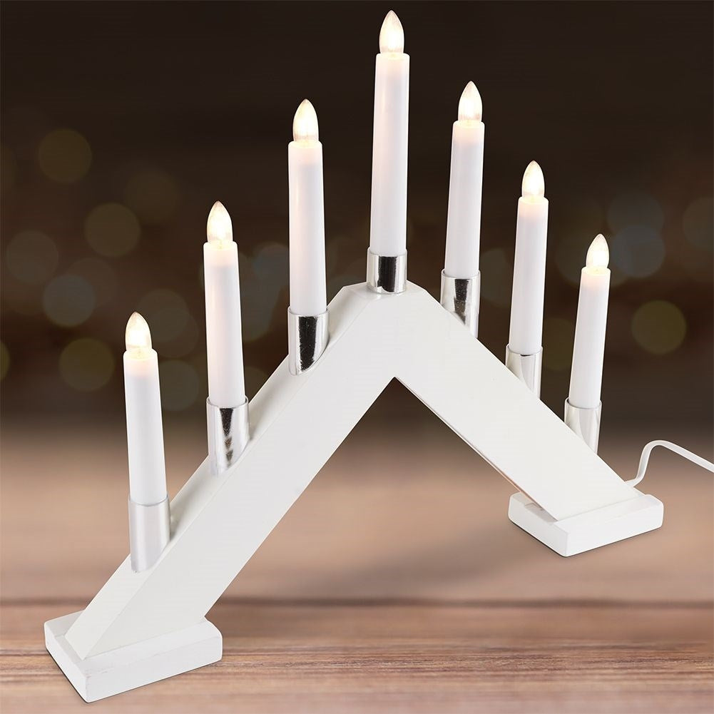 Advent candle holder with seven LED lights and white wooden base