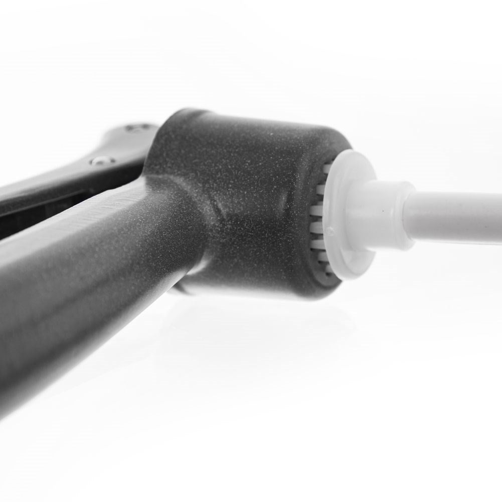 Aluminum garlic press with cleaning tool