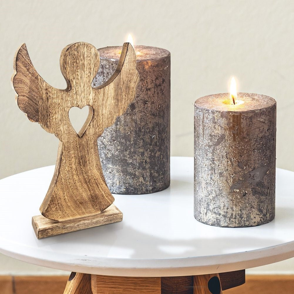 Angel in mango wood with heart - natural decoration