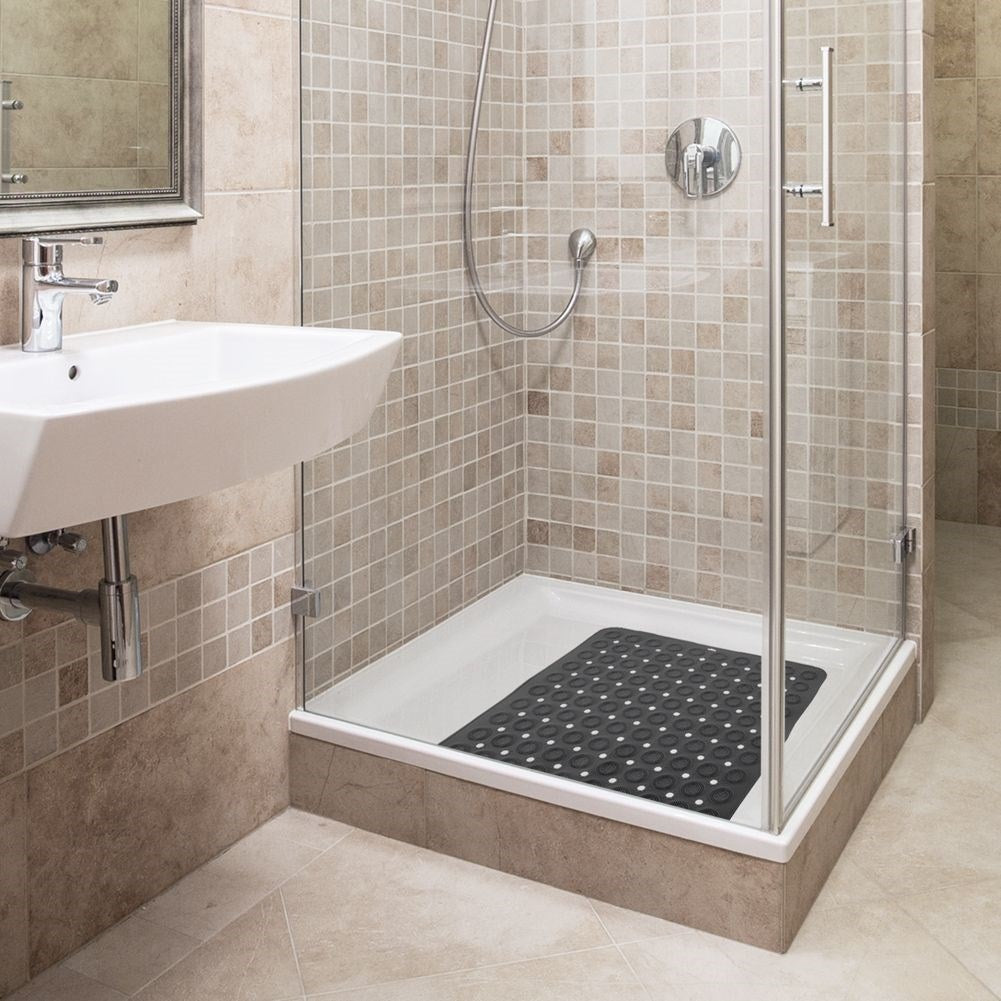 Anti-slip mat with massaging knobs for a safe shower/bath