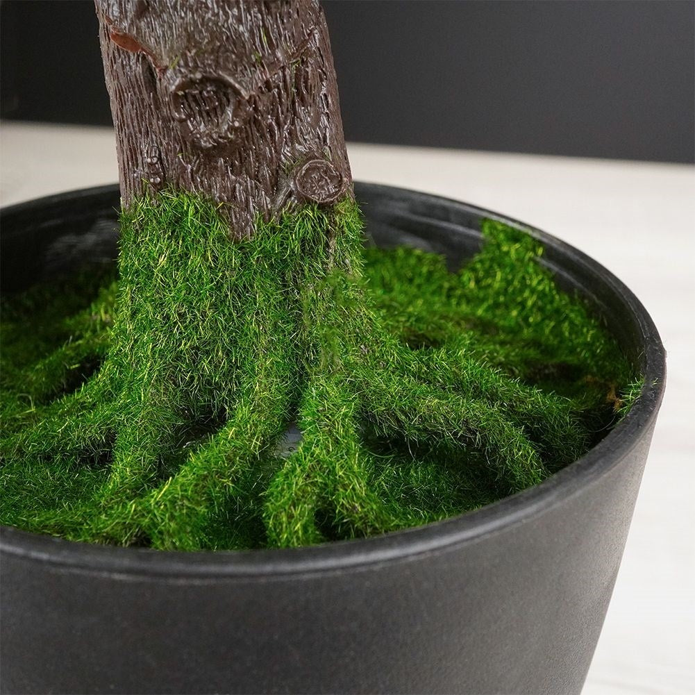 Artificial bonsai tree in black pot