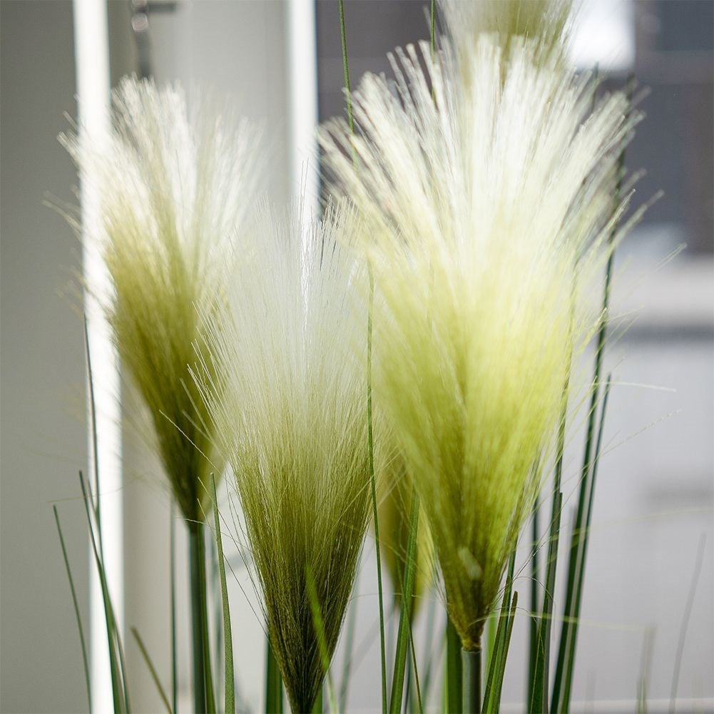 Artificial pampas grass in black pot with five flowers