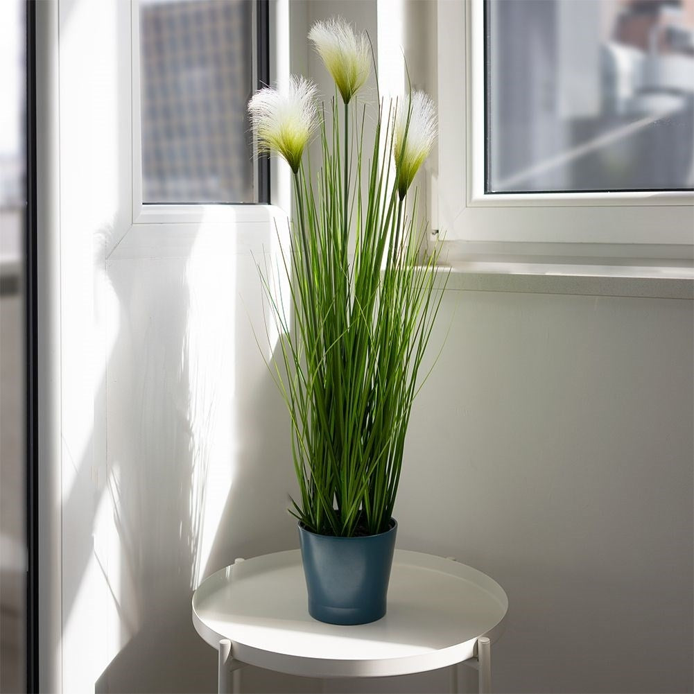 Artificial pampas grass with three flowers in black pot