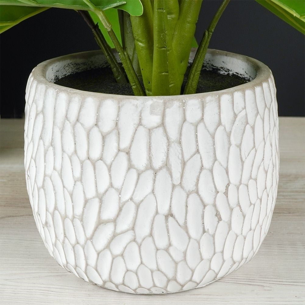 Artificial syngonium plant in decorative pot, realistic and maintenance free