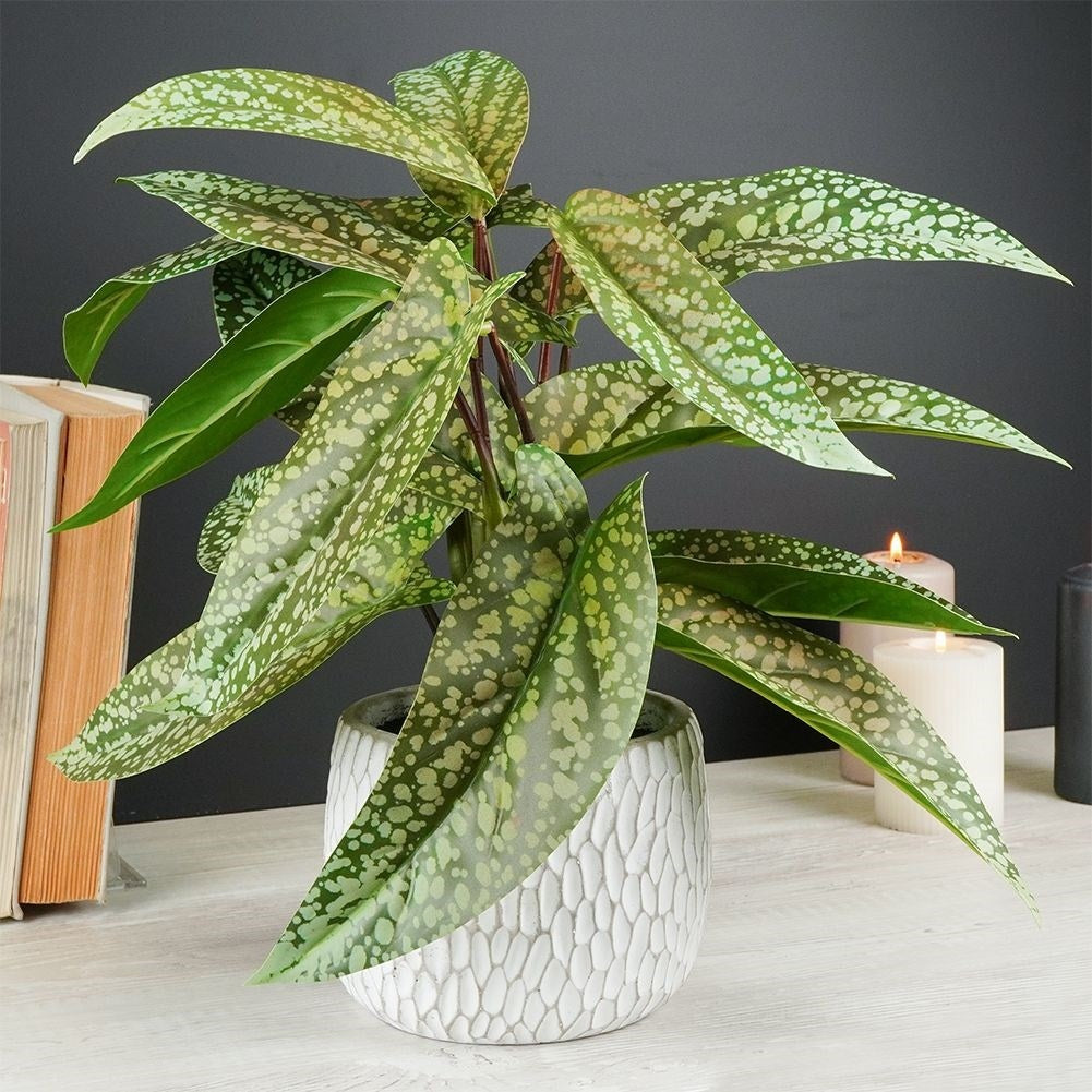 Artificial syngonium plant in decorative pot, realistic and maintenance free