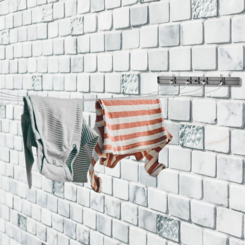 Automatic drying rack with four lines for small spaces