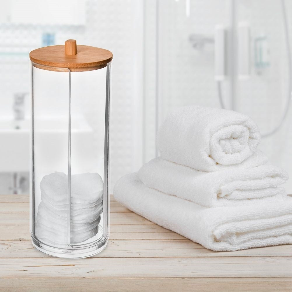 Bamboo coated cotton pad container with elegant design