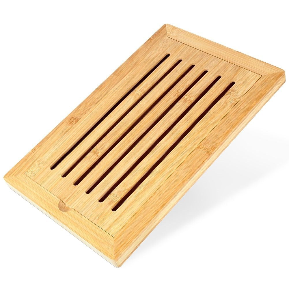 Bamboo cutting board with crumb collector