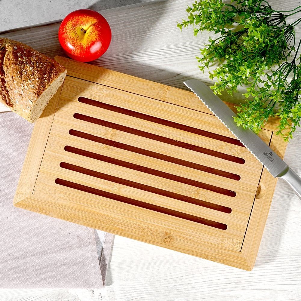Bamboo cutting board with crumb collector