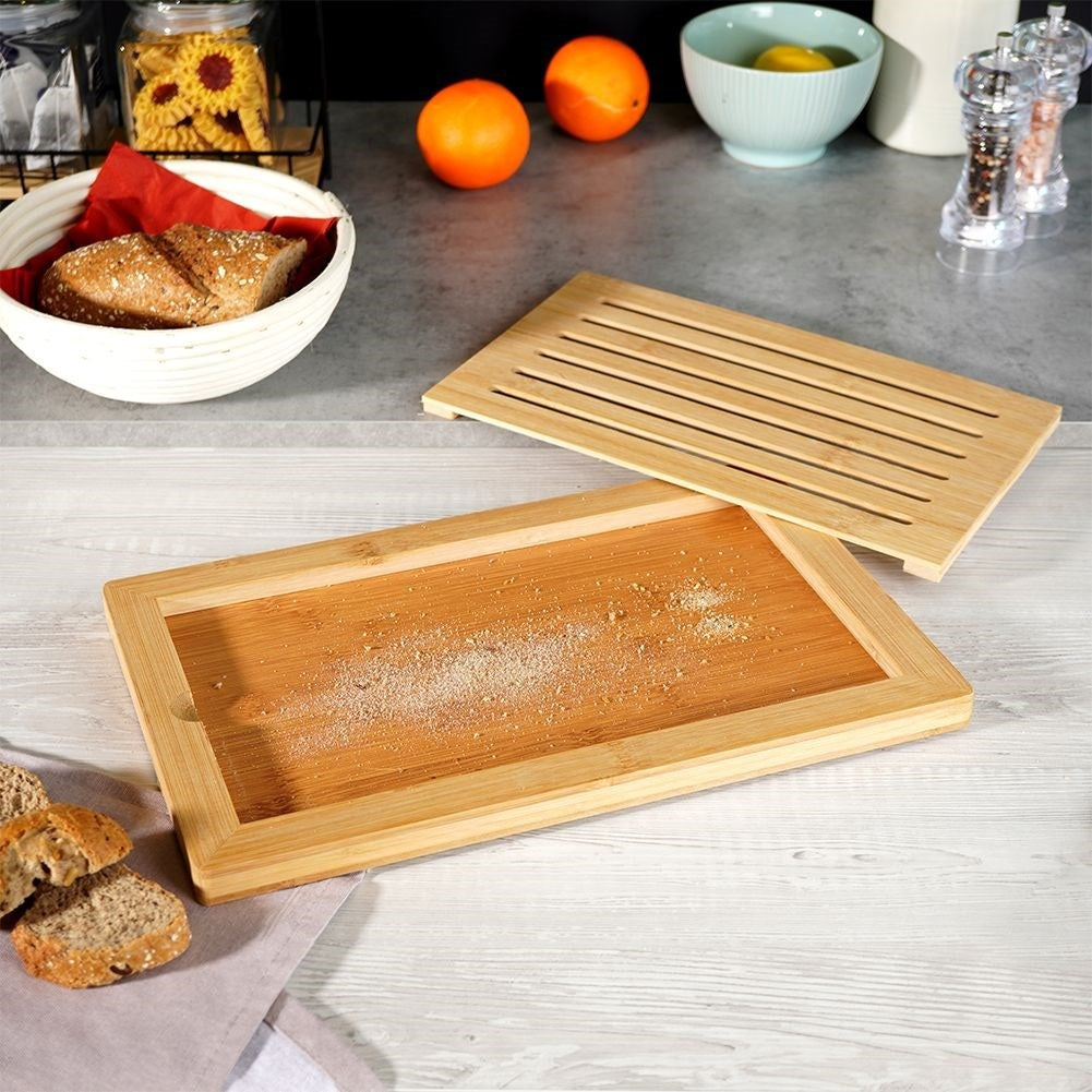 Bamboo cutting board with crumb collector